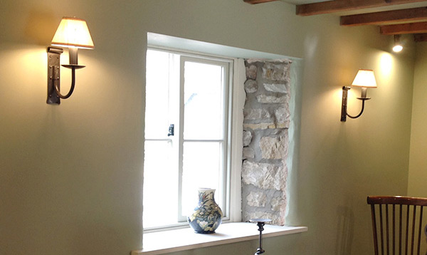 A brief history of the wall light or wall sconce