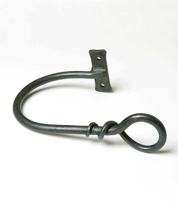 Rat Tail - wrought iron holdback