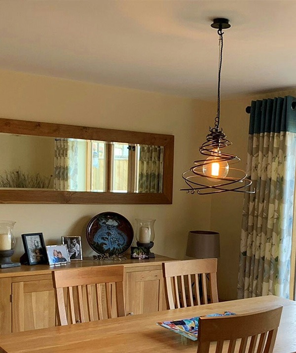 Julie sent us this picture of the Maythorne pendant in her home
