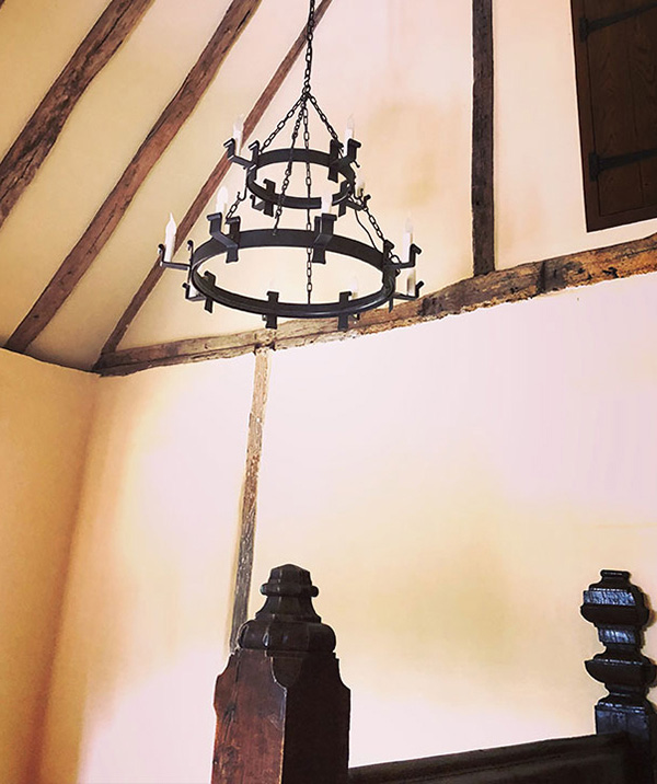 A chandelier over the stairs in this Kentish manor house