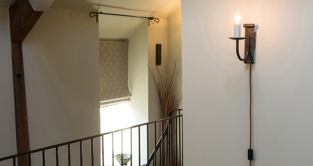 Introducing plug-in wall lights swaine single