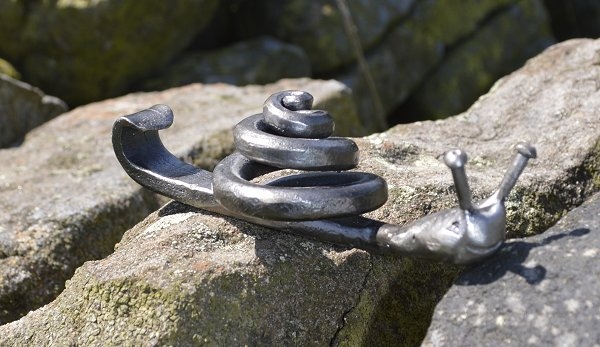 Blacksmith Kieren Stables with Brian the Snail