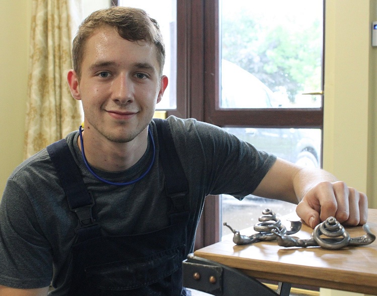 Blacksmith Kieren Stables with Brian the Snail