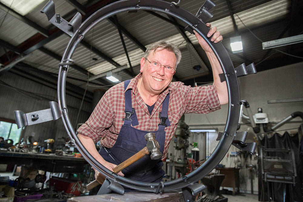 Nigel Tyas through chandelier hoop